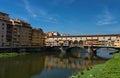 FLORENCE, ITALY Ã¢â¬â ÃÅÃÂY 25, 2017: River Arno and famous bridge Ponte Vecchio The Old Bridge at sunny summer day. Royalty Free Stock Photo